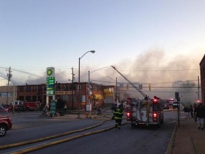 Firefighters fighting a fire in Remington